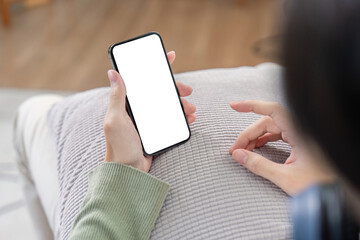 Young Professional Using Smartphone for Social Media Engagement