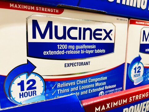 Pack of Mucinex expectorant to relieve chest and nasal congestion during colds and flu.