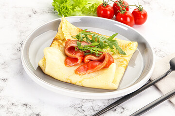 Russian pancake with salmon fish