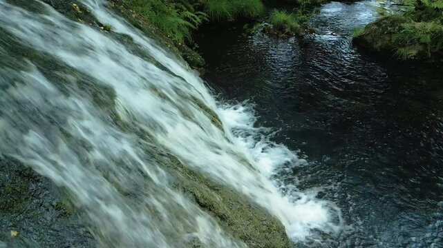 Waterfall Cascades In River. closeup shot