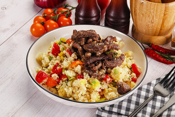 Traditional couscous with beef and vegetables