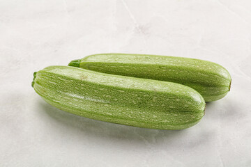 Raw green ripe zucchini vegetable