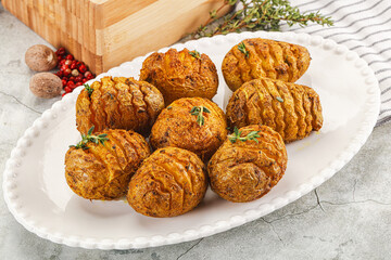 Baked baby potato with thyme