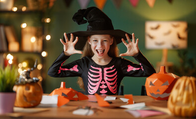 girl with Halloween pumpkins