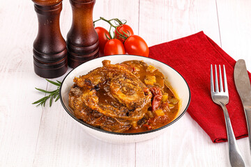 Italian cuisine - ossobuco with sauce