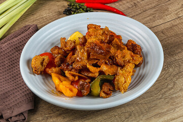 Asian cuisine - roasted crocodile meat