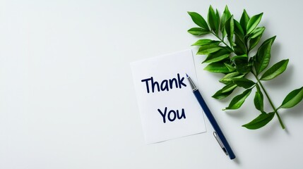 Minimalist handwritten "thank you" notes are placed on a white desktop, emphasizing the clarity of text and paper. A concise composition suitable for expressing gratitude and appreciation themes.