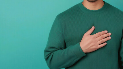 Person holding a hand to their chest, Chest Tightness, showcasing physical symptoms like somatic pain linked to depression