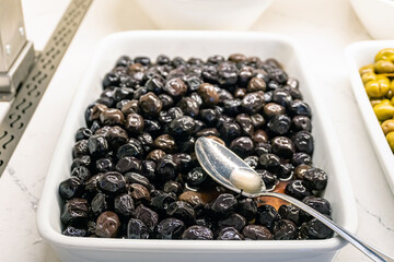 Black Olives in a Large Tray: Ingredient for Various Dishes