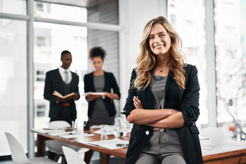 Crossed arms, smile and portrait of businesswoman with people in office for leadership in career....