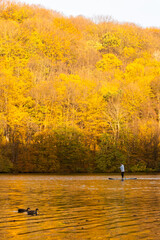Paddleboarding in Autumn Serenity