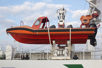 Lifeboat on a large cargo ship.