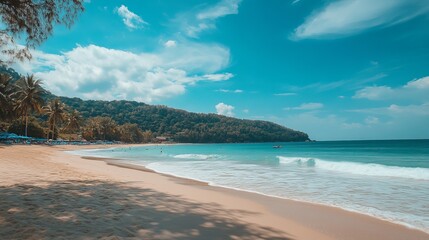 Kata Noi Beach in Phuket, Thailand, is a picturesque paradise with its pristine, white sandy shores and crystal-clear turquoise waters.
