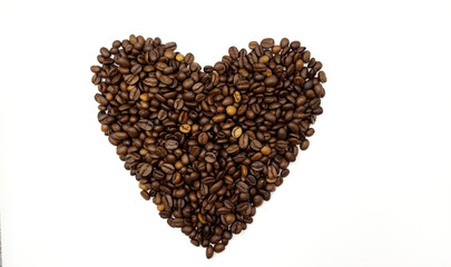 heart made of roasted natural coffee beans on a white background
