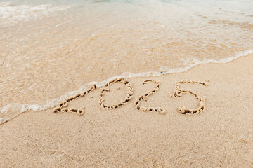 Christmas inscription 2005 on the beach