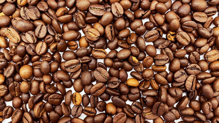 Natural roasted coffee beans on a white background.
