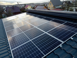 Solar panels on pitched metal roof. Home Renewable Energy Systems. Solar Rooftop System....