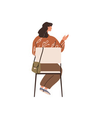 Two individuals are engaged in a casual conversation. One person wears a patterned top and shoulder bag, while sitting on a chair. Ideal for communication, relationships, social interaction