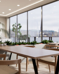 A modern restaurant in a skyscraper features minimal wooden tables, armchairs, and indoor plants.