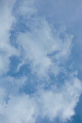 Blue sky and white and gray clouds. Texture background for design.