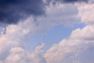 Blue sky and white and gray clouds. Texture background for design.