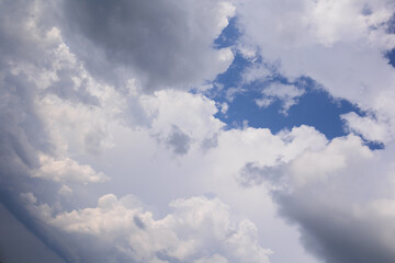 Blue sky and white and gray clouds. Texture background for design.
