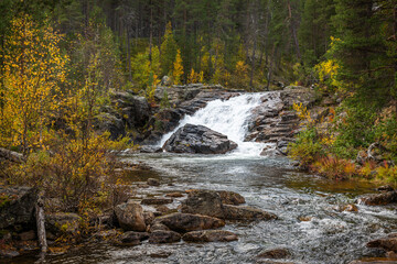 Ravadasköngäs waterfall in autumn