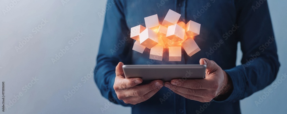 Poster a person holding a tablet with 3d cubes hovering above, representing digital technology and innovati