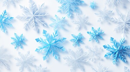 Beautifully crafted blue and white paper snowflakes scattered on a light background during winter