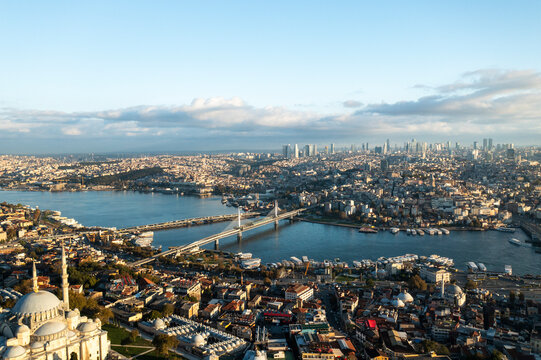Aerial view of historic cityscape with mosques and bridges over the Bosphorus, Fatih, Turkiye.