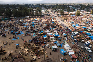 Aerial view of a bustling traditional market with colorful stalls and vendors, Halaba Kulito, Ethiopia.