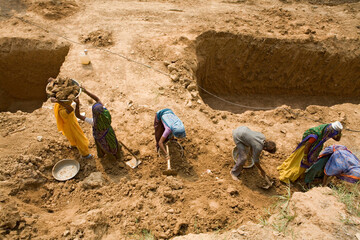 Aerial view of Workers at a construction site engaged in manual unskilled work, Ahmedabad, Gujarat, India