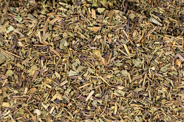 Dry basil spice seasoning macro texture top view