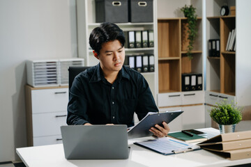 business man executive manager looking at laptop watching online webinar training