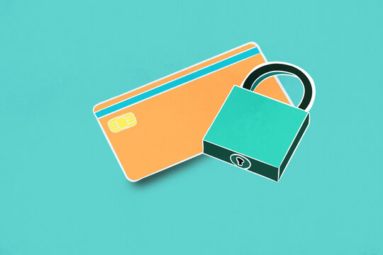 Credit card secured by a padlock on a teal background