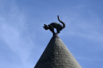 Cat House in Riga, Latvia. The cat sculpture on the roof of Cat House in Riga.