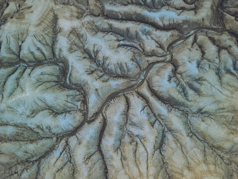 Aerial view of majestic rock formations and rugged terrain in Bardenas Reales, Cortes, Navarre, Spain.