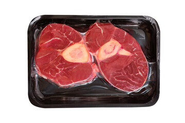 Meat on the bone in vacuum packaging, fresh meat, beef, raw meat on a white background, isolated
