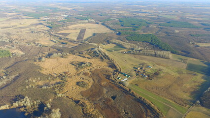 Aerial Autumn Landscape with Forest Textures and a Hidden Pond
