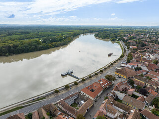 European flood aerial view: Szentendre (Hungary) mobile flood protection walls defend.