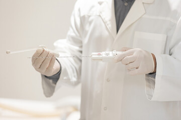 Doctor prepare prostate cancer biopsy device for use