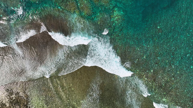 Aerial view of beautiful tropical island with clear turquoise water and pristine sandy beach, Shefa, Vanuatu.