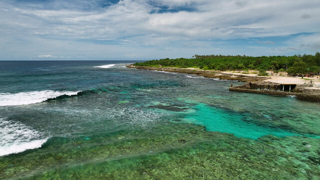 Aerial view of tropical island with palm trees and clear water, Shefa, Vanuatu.
