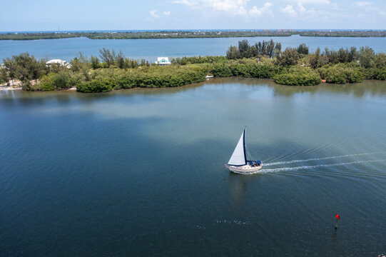 Aerial view of Grant Farm Island in the Indian River Lagoon with serene waters and lush greenery, Grant Valkaria, United States.