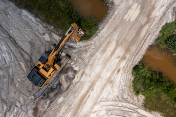 Aerial view of construction site with excavators and machinery in development, Fellsmere, United States.