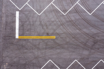 Aerial view of a geometric parking lot with lines and asphalt at a construction site, Wabasso, Florida.