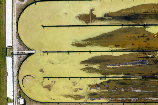 Aerial view of Parabel Nutrition aquaculture facility with raceways and green vegetation, Fellsmere, United States.