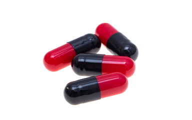 red black capsules isolated