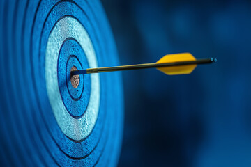 Arrow shot in bullseye of a blue target, strategy aim, business success, challenge performance