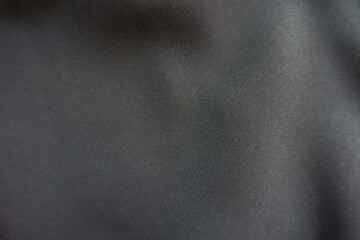 Texture of thin anthracite grey nylon chiffon fabric
